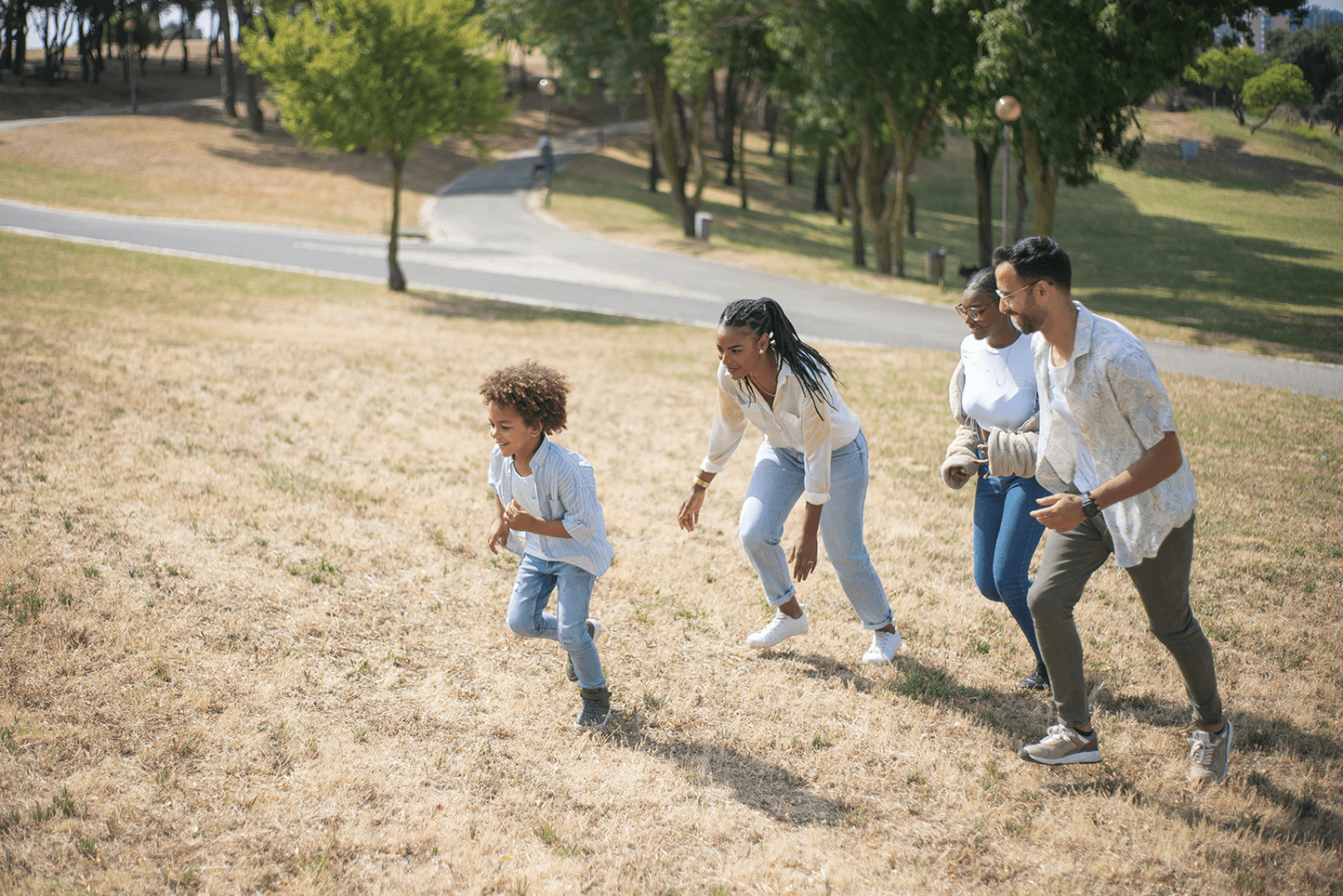 A family running together to reach their family fitness goals.